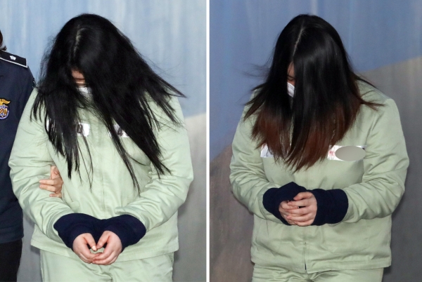 '인천 초등생 살인' 혐의로 구속된 피고인 박모씨와 김모씨가 30일 오후 항소심 선고 공판을 받기 위해 서울중앙지방법원으로 출석하고 있다. (사진=뉴시스)